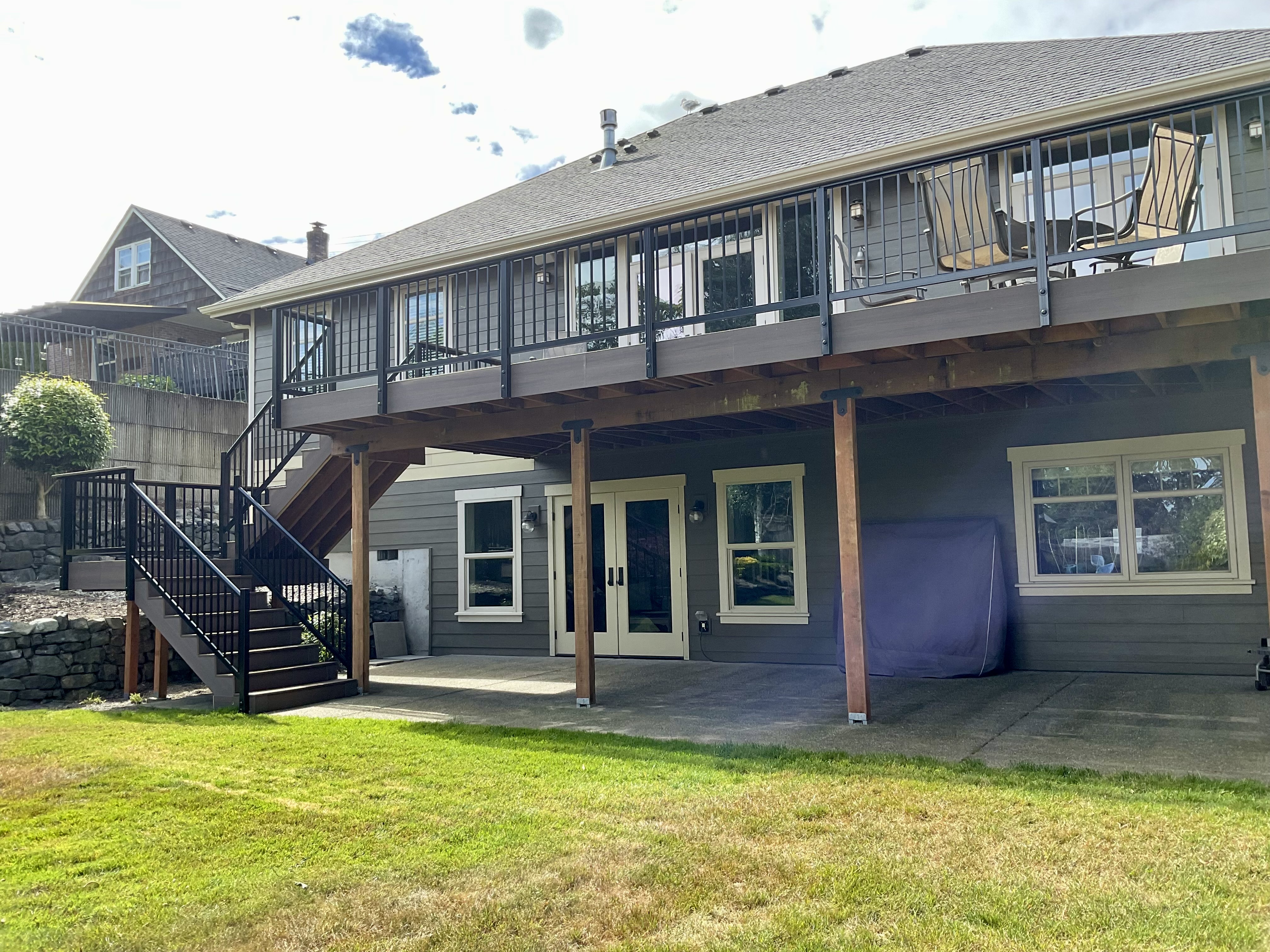 Wide view of The Khaya Project - UP deck with black aluminum picket railing