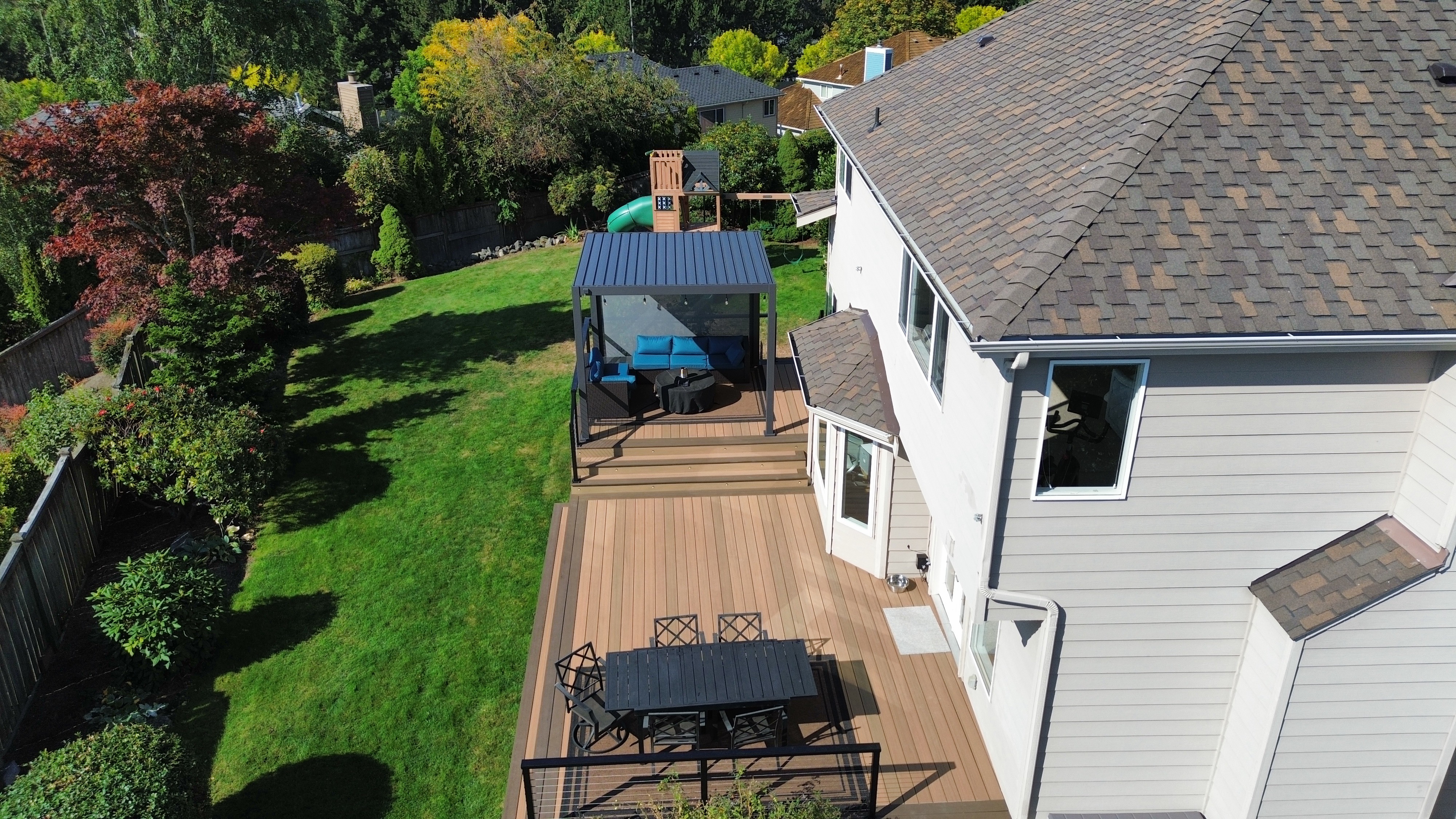 Multi-level TimberTech deck overview with cable railing