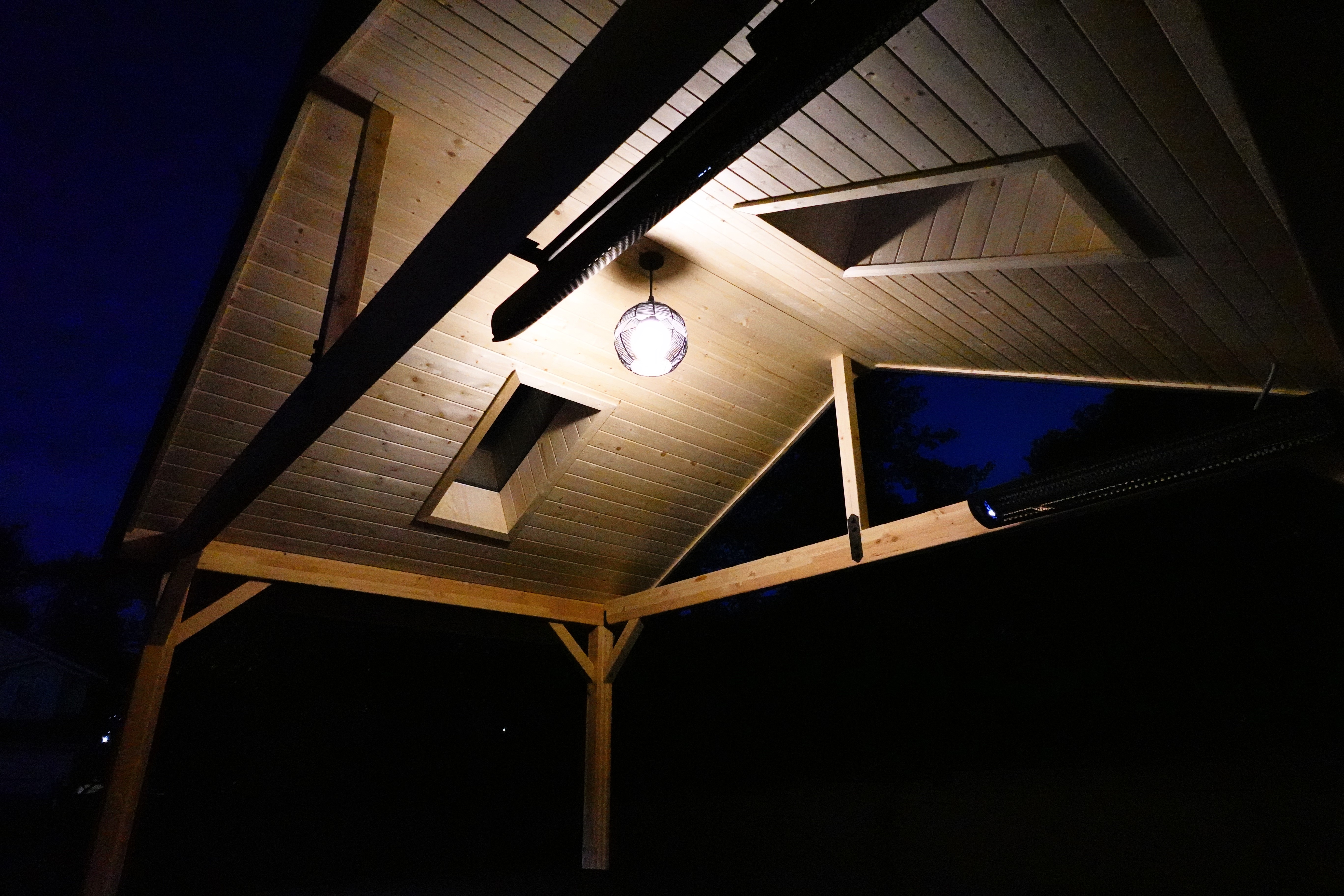 Glulam beams with black hardware accents