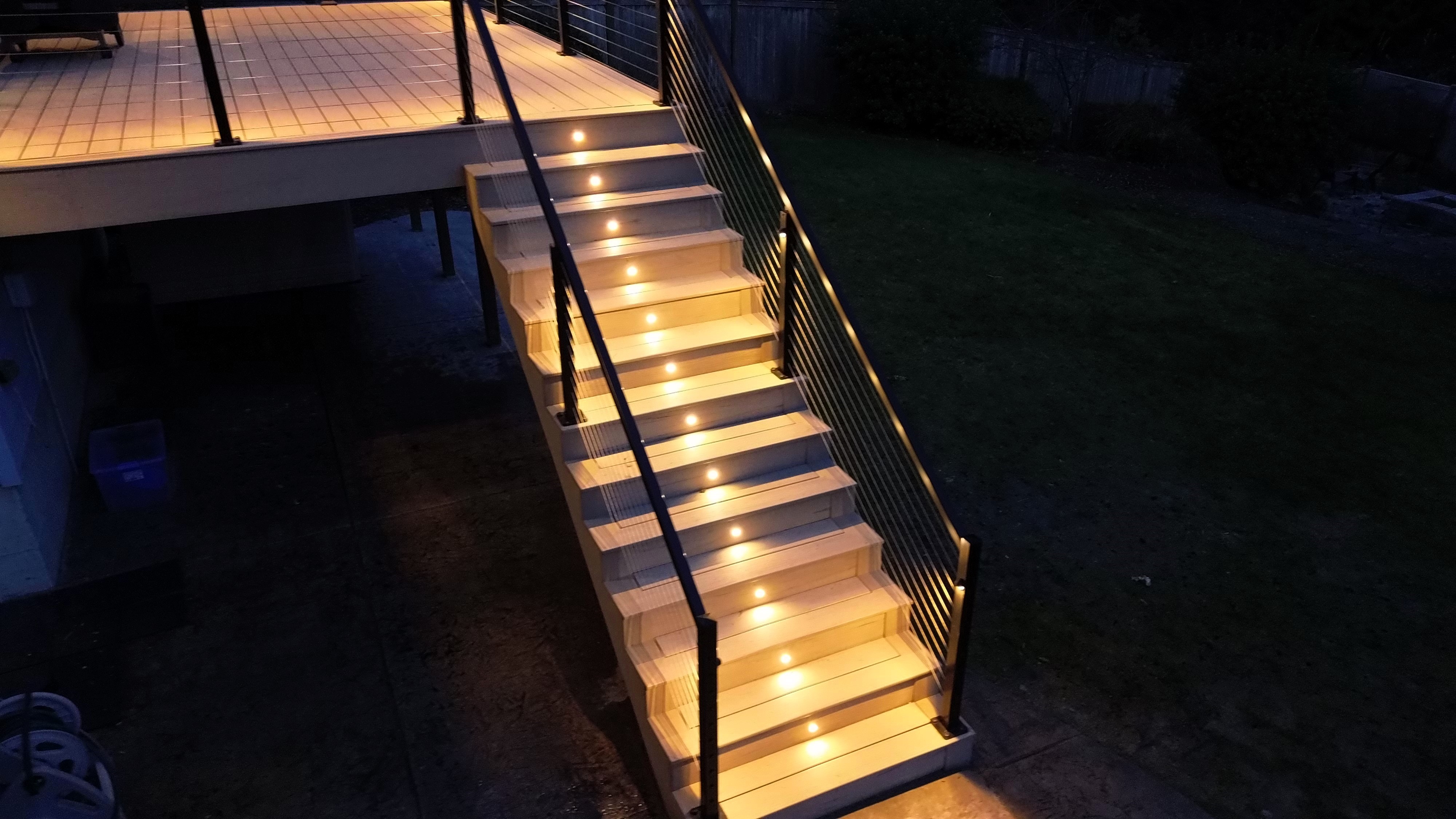 Wide view of multi-level Artondale Glow deck with hideaway screens