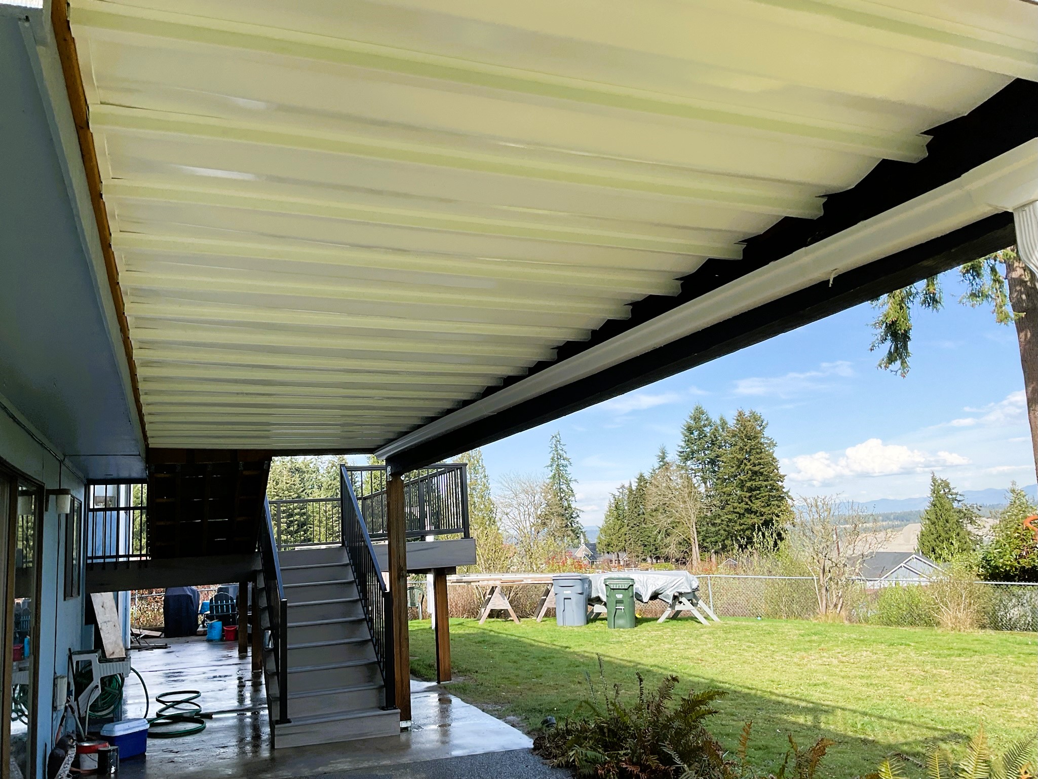 Wide view of TimberTech Driftwood multi-level deck with DrySpace