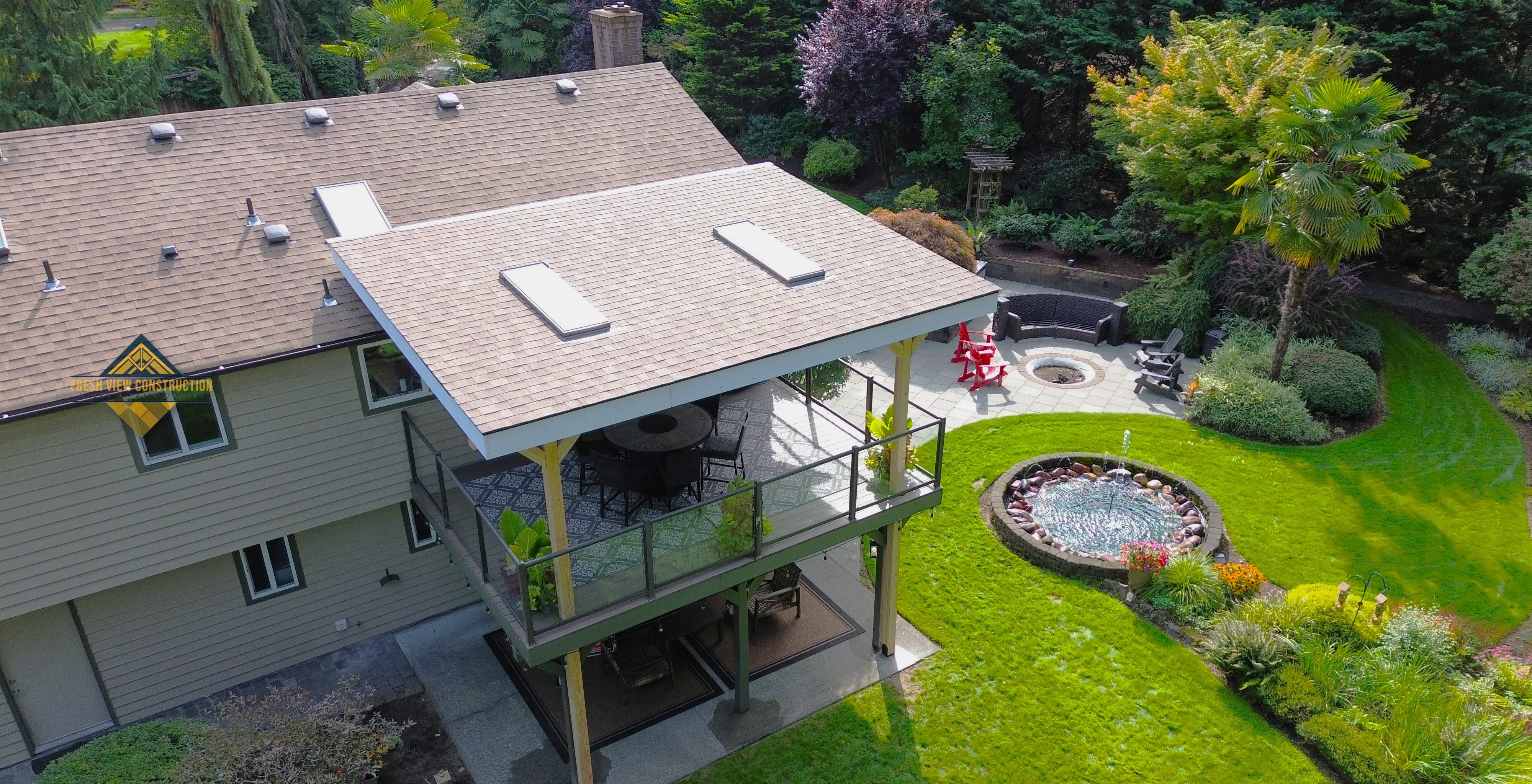 Tall second-story deck structure with black hardware in Auburn, WA