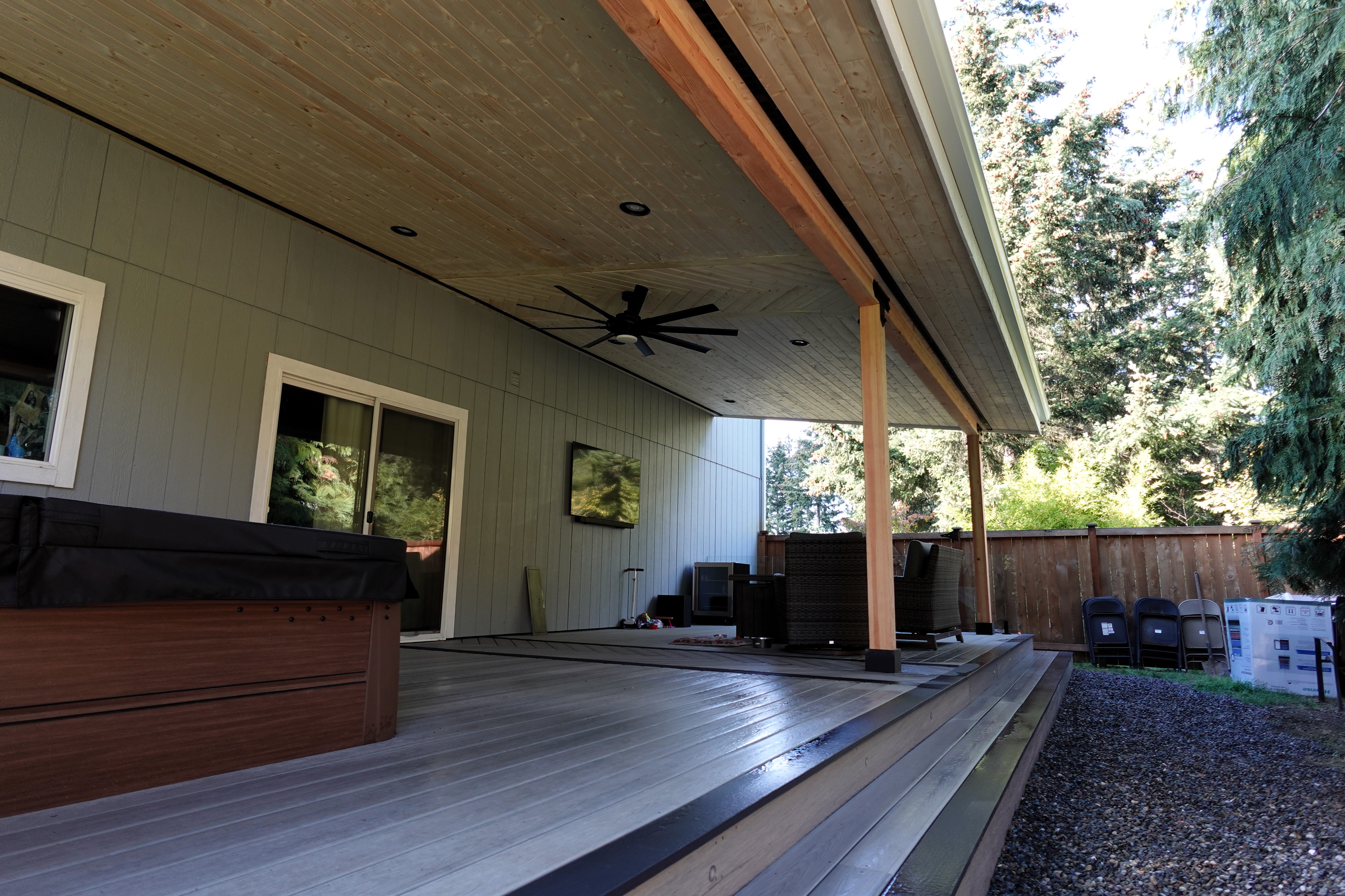 Deckorators composite covered deck with spa area