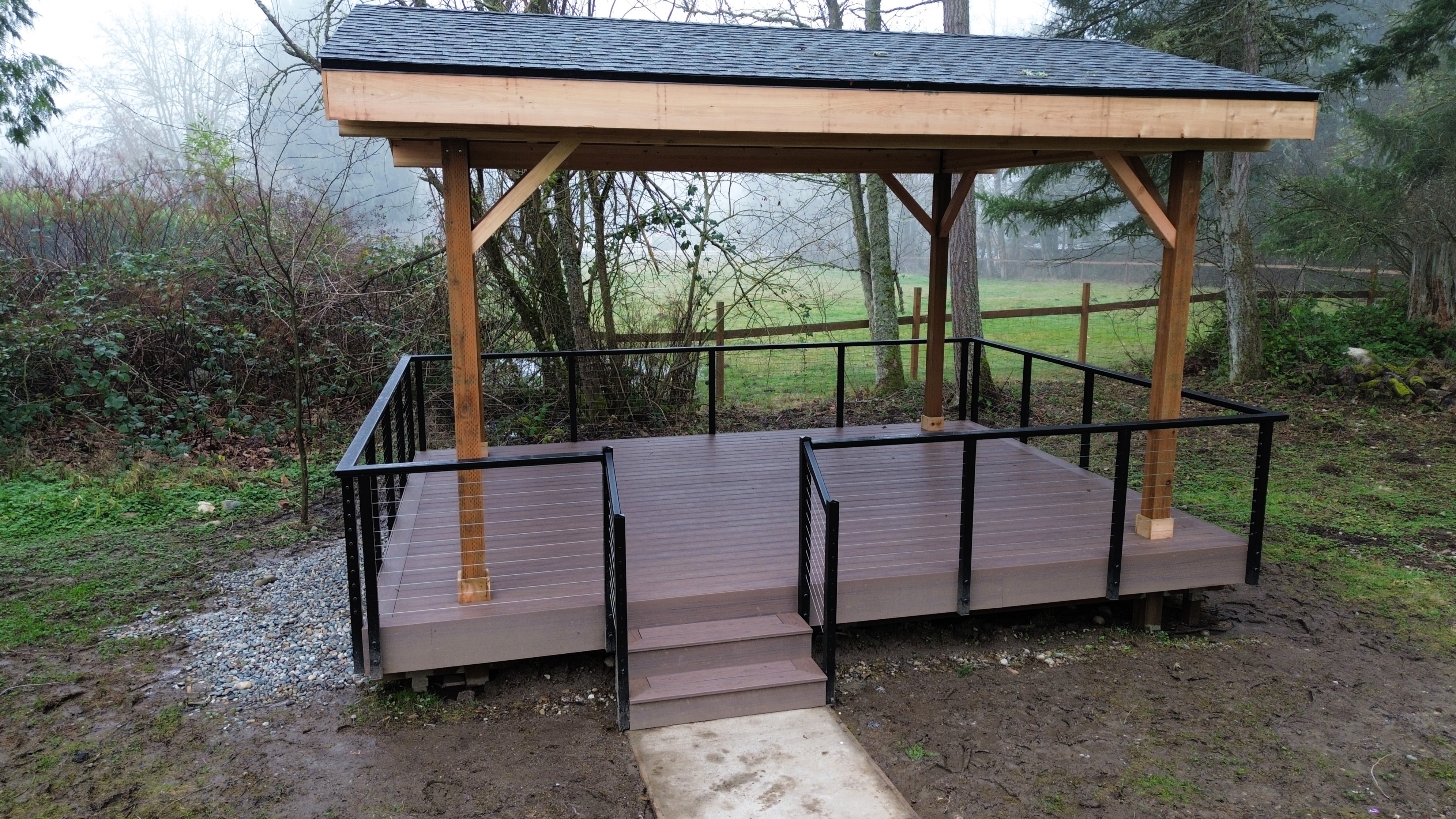 Finished 2x6 under-deck car decking on timber-frame covered deck